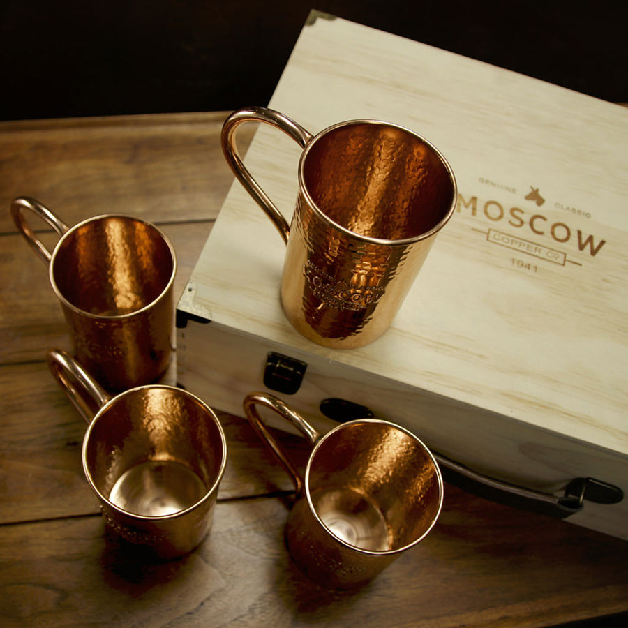 Stock up your bar with Moscow Copper Co.'s set of four hammered copper mule mugs.