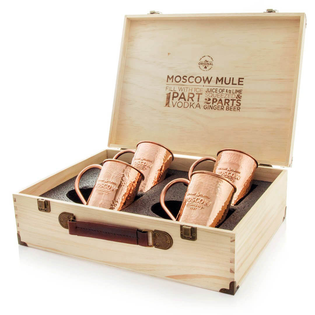 Four hammered copper Moscow Mule mugs in a beautiful pine gift box.